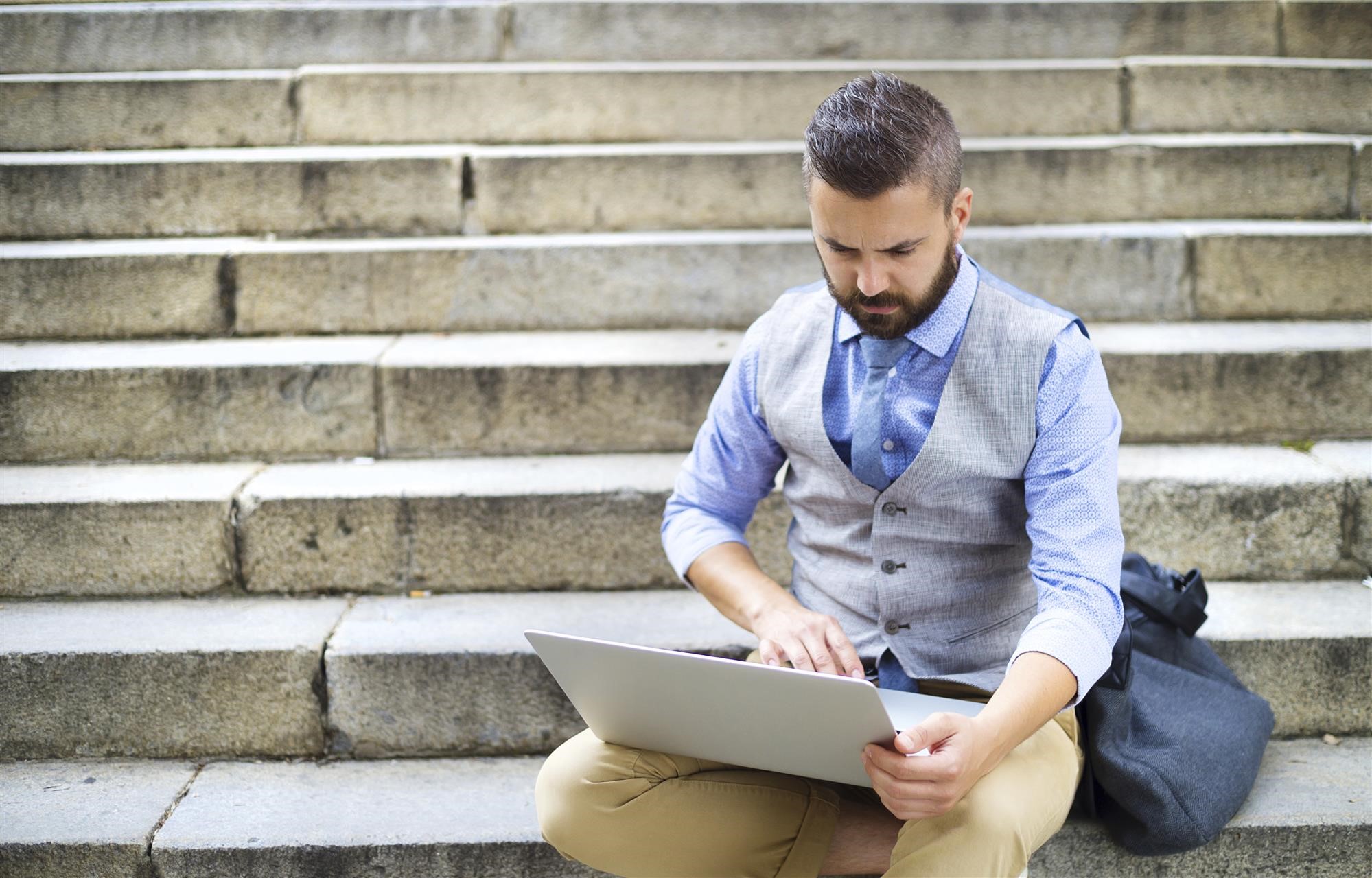 business_man_sitting_on_steps