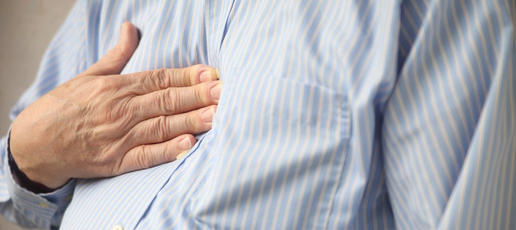 man experiencing heartburn ppi drugs are used for heartburn