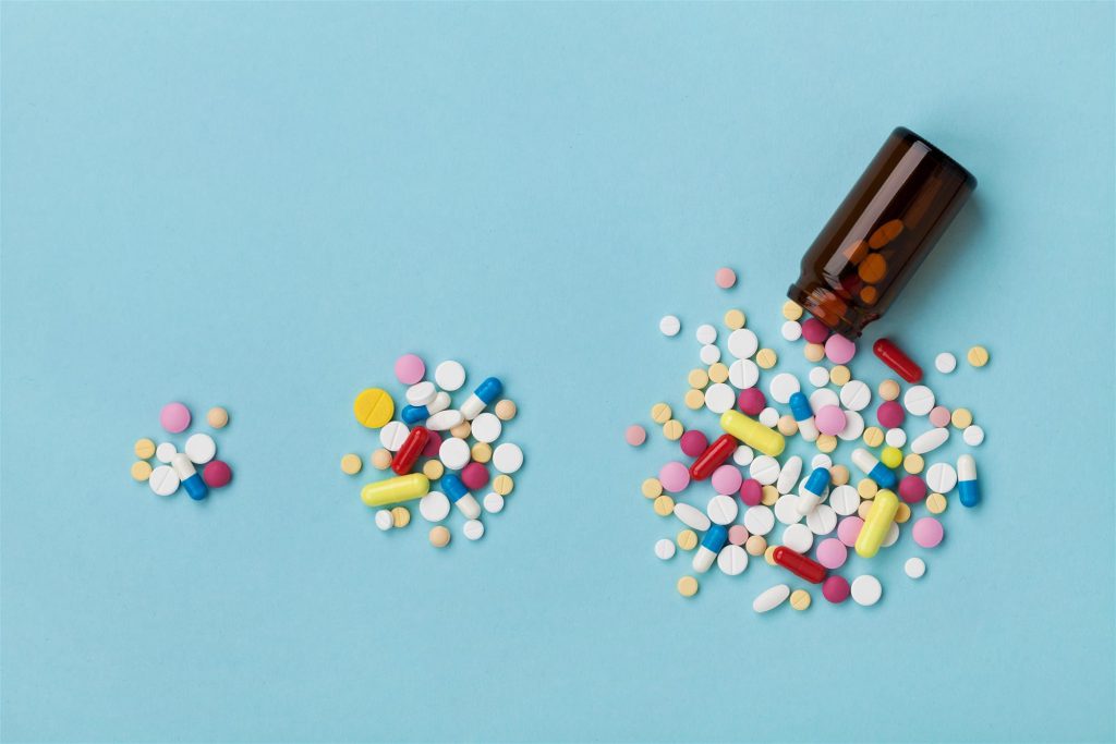 harmful prescription drugs spread on table